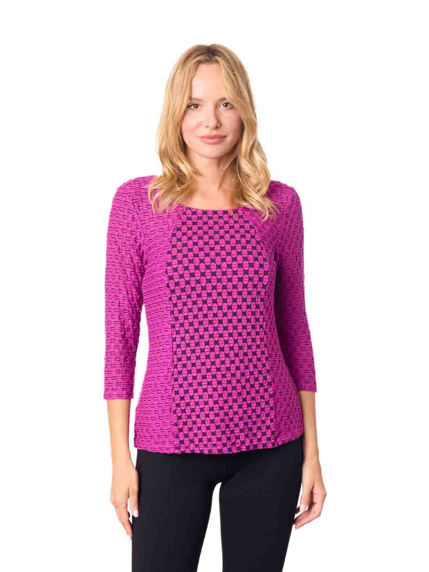 Woman wearing a pink patterned top