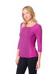Woman wearing a pink patterned top