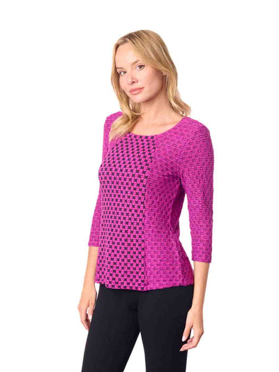 Woman wearing a pink patterned top