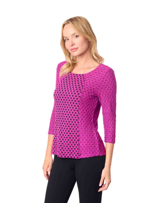Woman wearing a pink patterned top