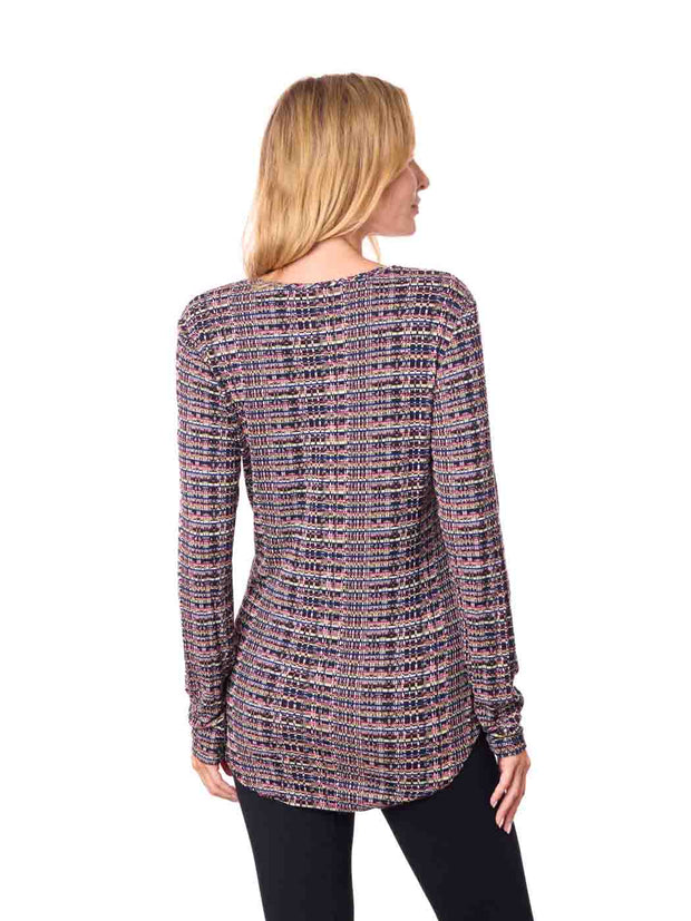 Woman wearing a patterned long-sleeve top