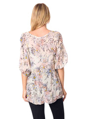 Woman wearing a floral blouse