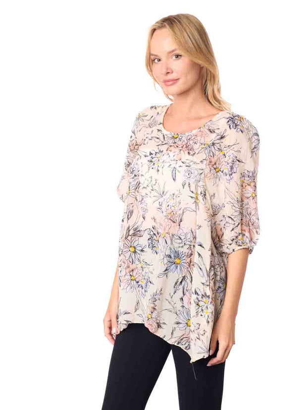 Woman wearing a floral blouse